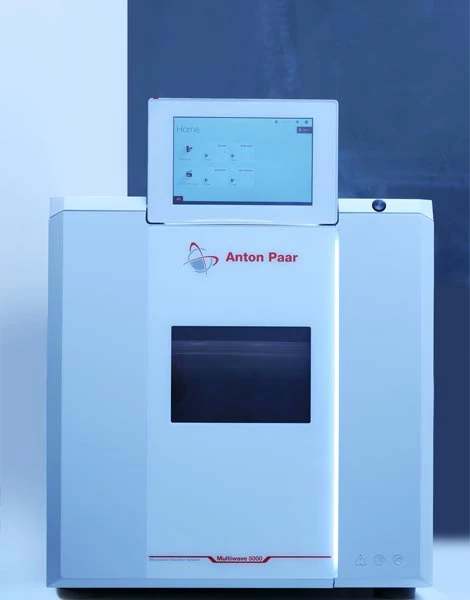 Front view of a white Anton Paar laboratory device with a touchscreen display.